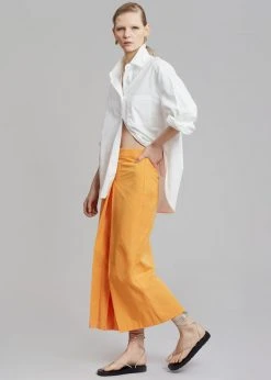 Inni Didi Pleated Midi Skirt - Orange CLOTHING